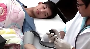 Asian twink gets examined and breeded from behind by doctor