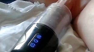 Sex toy fucked and sucked my tits with my cum