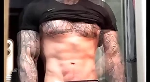 Stroking my massive cock and flexing of you winning cumming