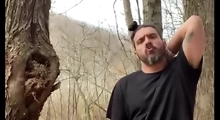 Horny latino hippie jerking off outside caught in the woods